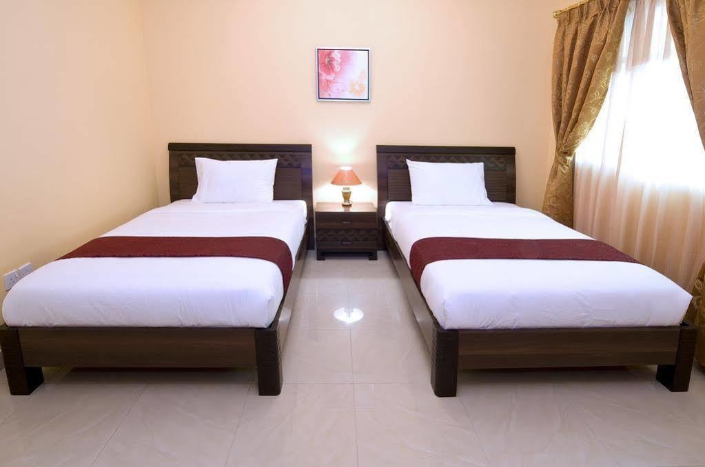 Tiger Home Hotel Apartments Маскат Екстериор снимка